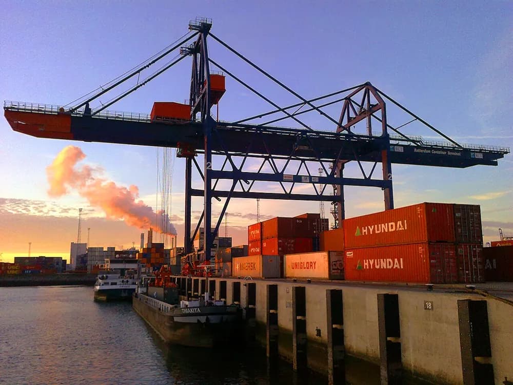 Container crane at a European port terminal at sunset